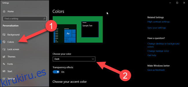 Página de configuración de color de Windows con flechas que apuntan a colores y opciones de tema