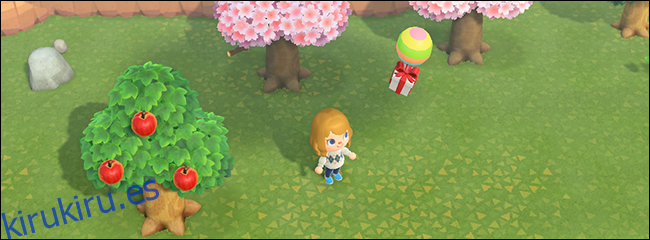Derribar un globo con una honda en Animal Crossing.