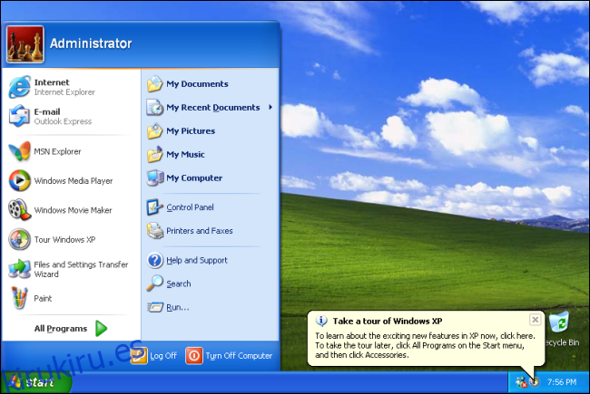 El menú Inicio en un escritorio de Windows XP con el campo verde y el fondo del cielo. 